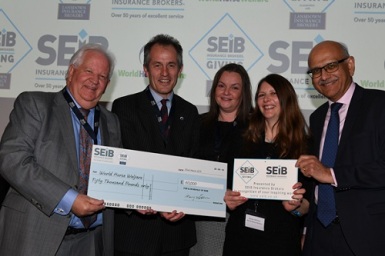 World-Horse-Welfare-receiving-their-cheque-L-to-R-Barry-Fehler-Roly-Owers-Suzy-Middleton-Emma-Williams-Bipin-Thaker